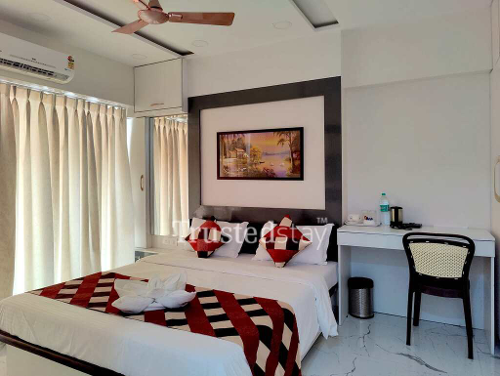 Bedroom one of TrustedStay ISON Height Service Apartment in Lower Parel, Mumbai